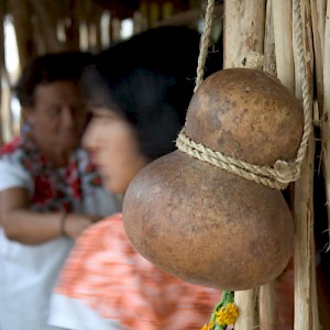 This traditional gourd hangs at the entrance to a Mayan hut erected in the Plaza Grande. <a href=></a>