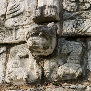 A Maya god is standing on the head of this 'Balam' or jaguar at Chichén Viejo. <a href=></a>
